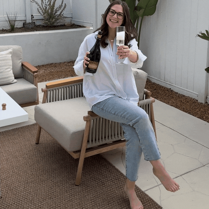 raising a glass of champagne to women entrepreneurs